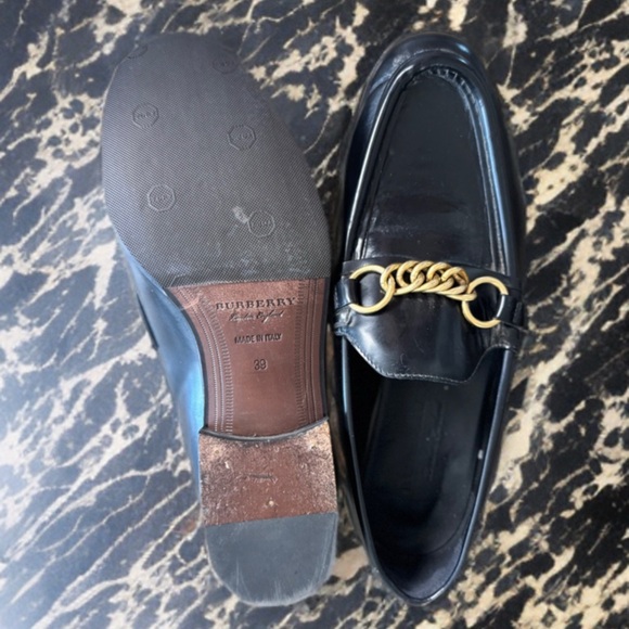 Burberry Black and Gold Slip-On Loafers with Chain Detail